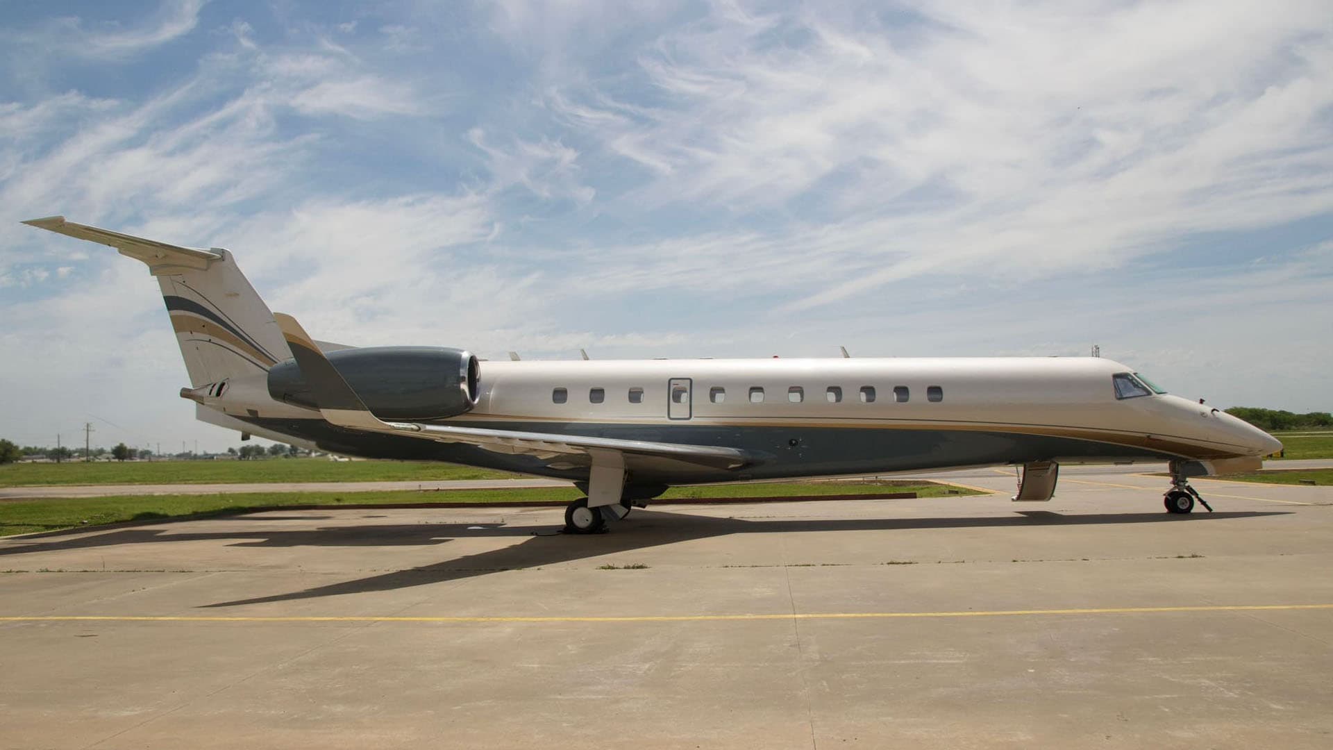 Embraer Legacy 600 private jet featuring a spacious multi-zone cabin and long-range performance