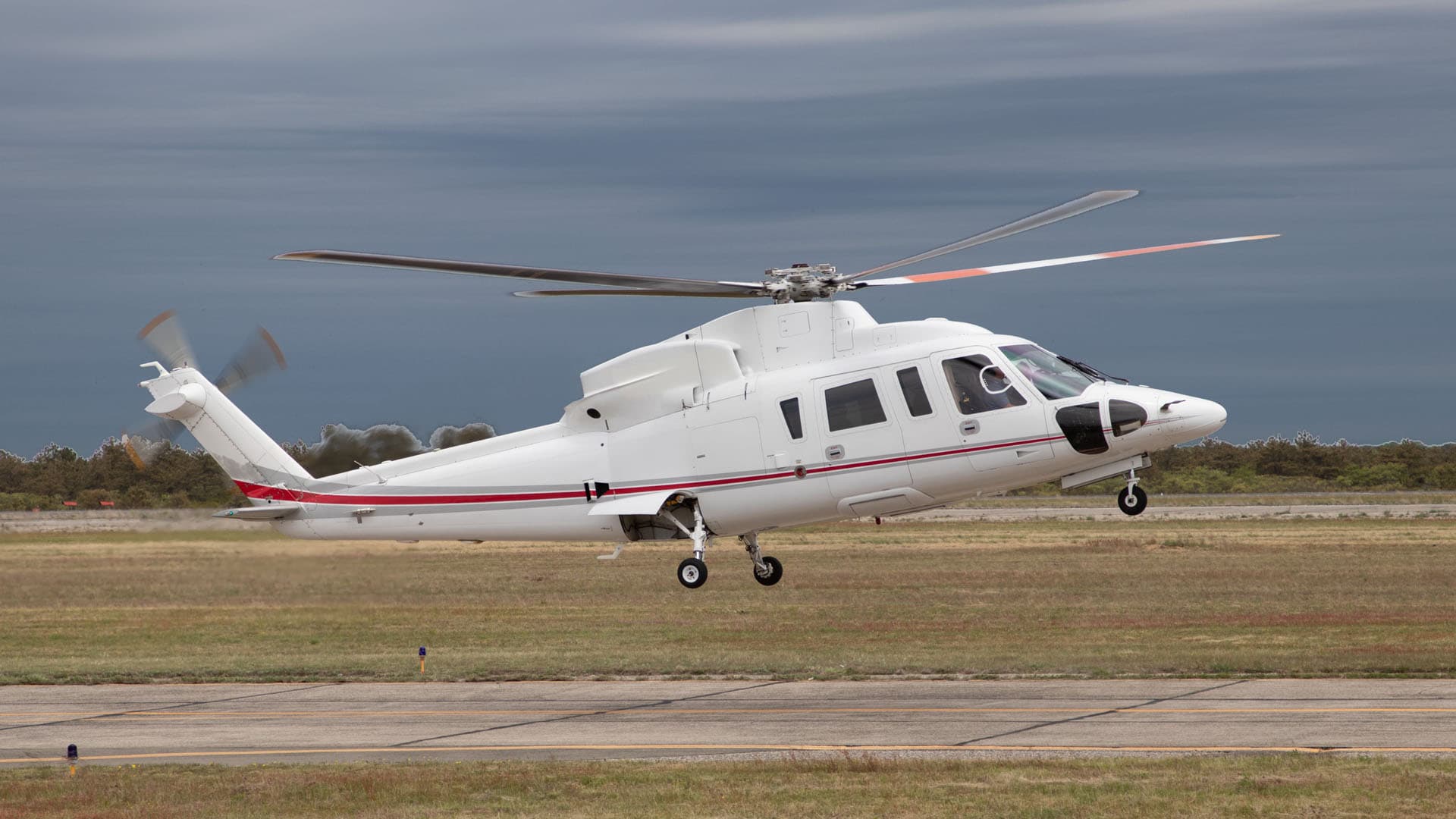 Sikorsky S-76C+ twin-engine VIP helicopter on the apron